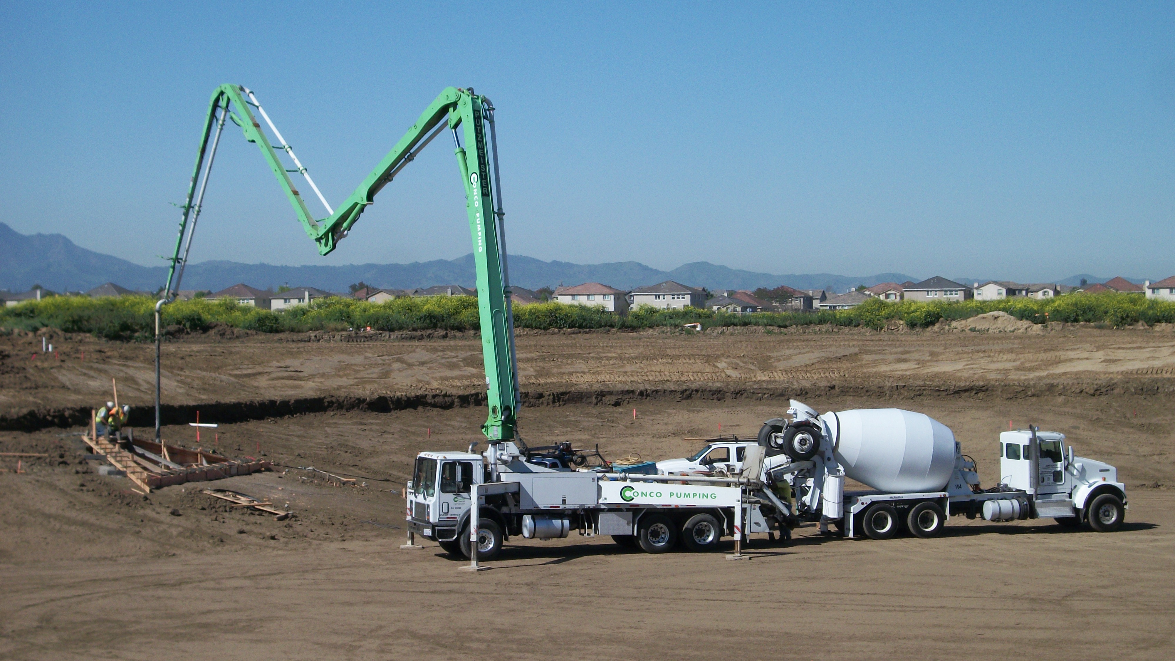 West Shore Concrete Pump and Mixer Trucks on Jobsite